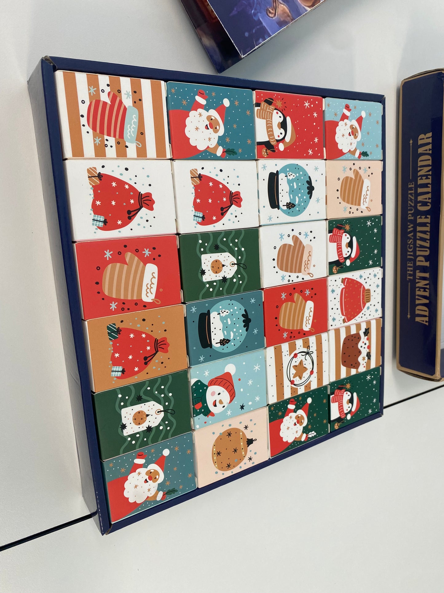 Christmas Advent Calendar Puzzle 1008 Pieces – 24 Days Countdown with Daily 42-Piece Mini Puzzles – Large 19.7 x 27.6 inch Jigsaw, Holiday Challenge for Adults & Families